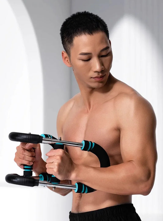Man using an arm exercise device against a white background