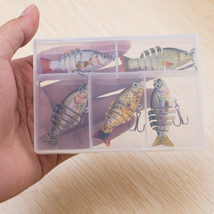 Transparent plastic case with fishing lures on a wooden surface