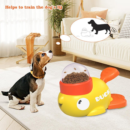 Dog playing with a yellow and orange toy shaped like a fish in a living room.