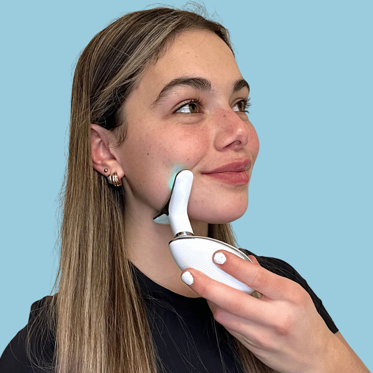 Woman using the FaceWave Sculpting Tool 2